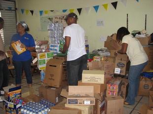 Image #11 - Hurricane Tomas Relief Effort (Packing the goods)